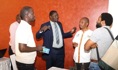 The Quality Assurance Director Dr. Cyprian Misinde (C) interacts with staff after the presentations on 1st November 2024. Tororo Girls School College of Humanities and Social Sciences (CHUSS) Staff Retreat, 1st-2nd November 2024, Nican Resort Hotel, Seguku Entebbe Road, Kampala Uganda, East Africa.