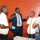 The Quality Assurance Director Dr. Cyprian Misinde (C) interacts with staff after the presentations on 1st November 2024. Tororo Girls School College of Humanities and Social Sciences (CHUSS) Staff Retreat, 1st-2nd November 2024, Nican Resort Hotel, Seguku Entebbe Road, Kampala Uganda, East Africa.