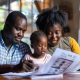 A family of three a father mother and daughter sit at a table looking at a newspaper. This photo was generated with AI.